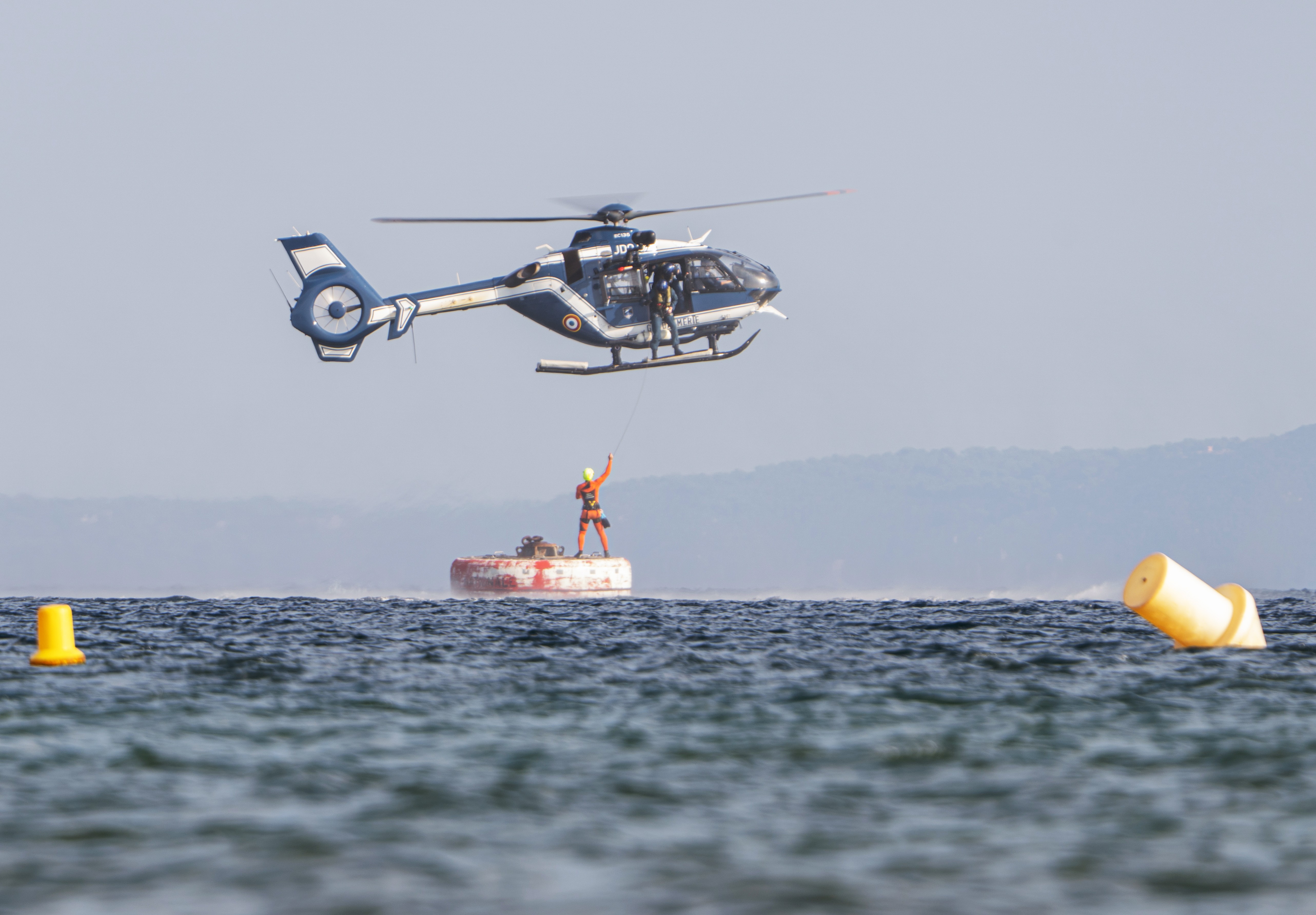 Helicopter winching exercise with an EC135 of the National Gendarmerie Air Force