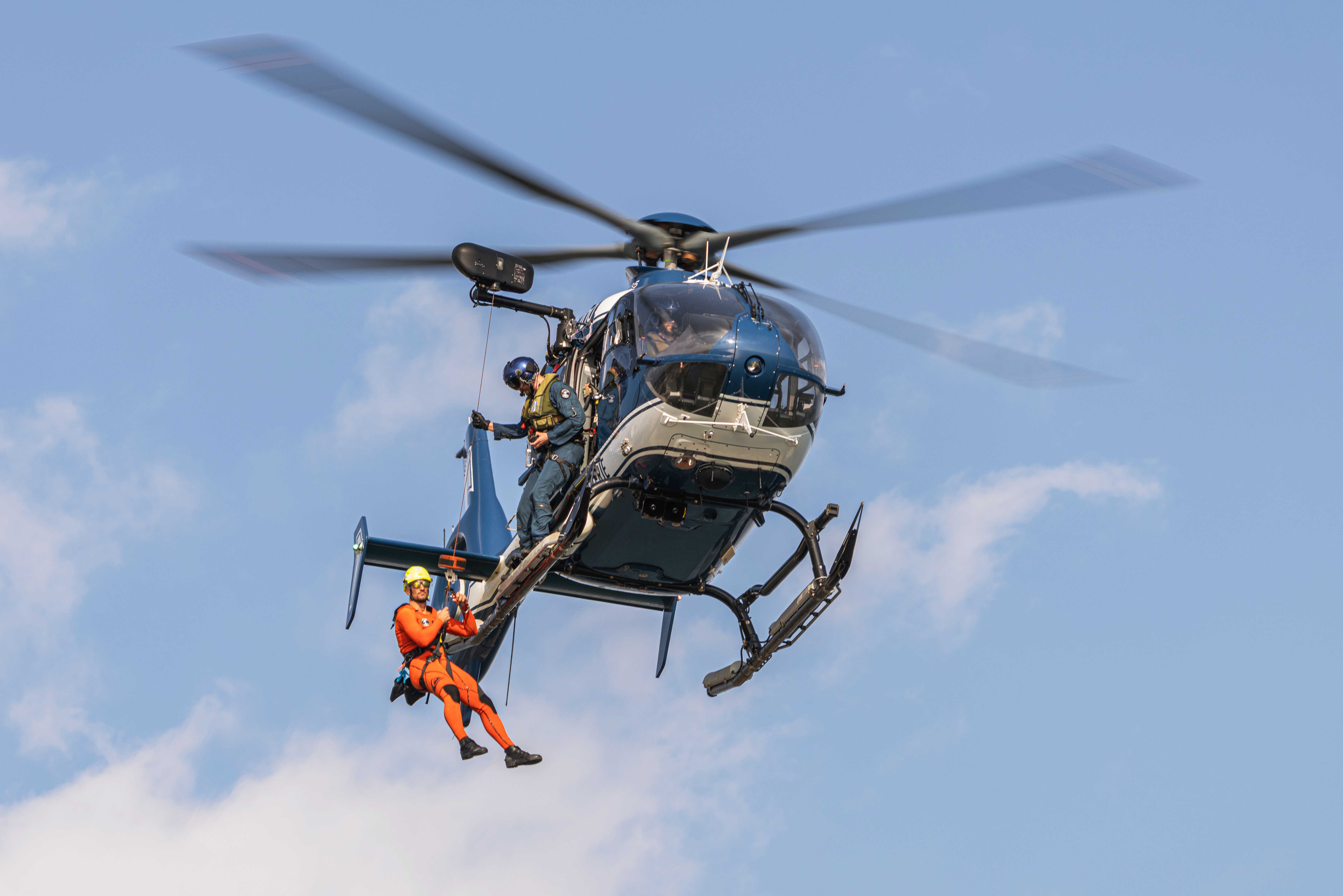 Helicopter winching exercise with an EC135 of the National Gendarmerie Air Force