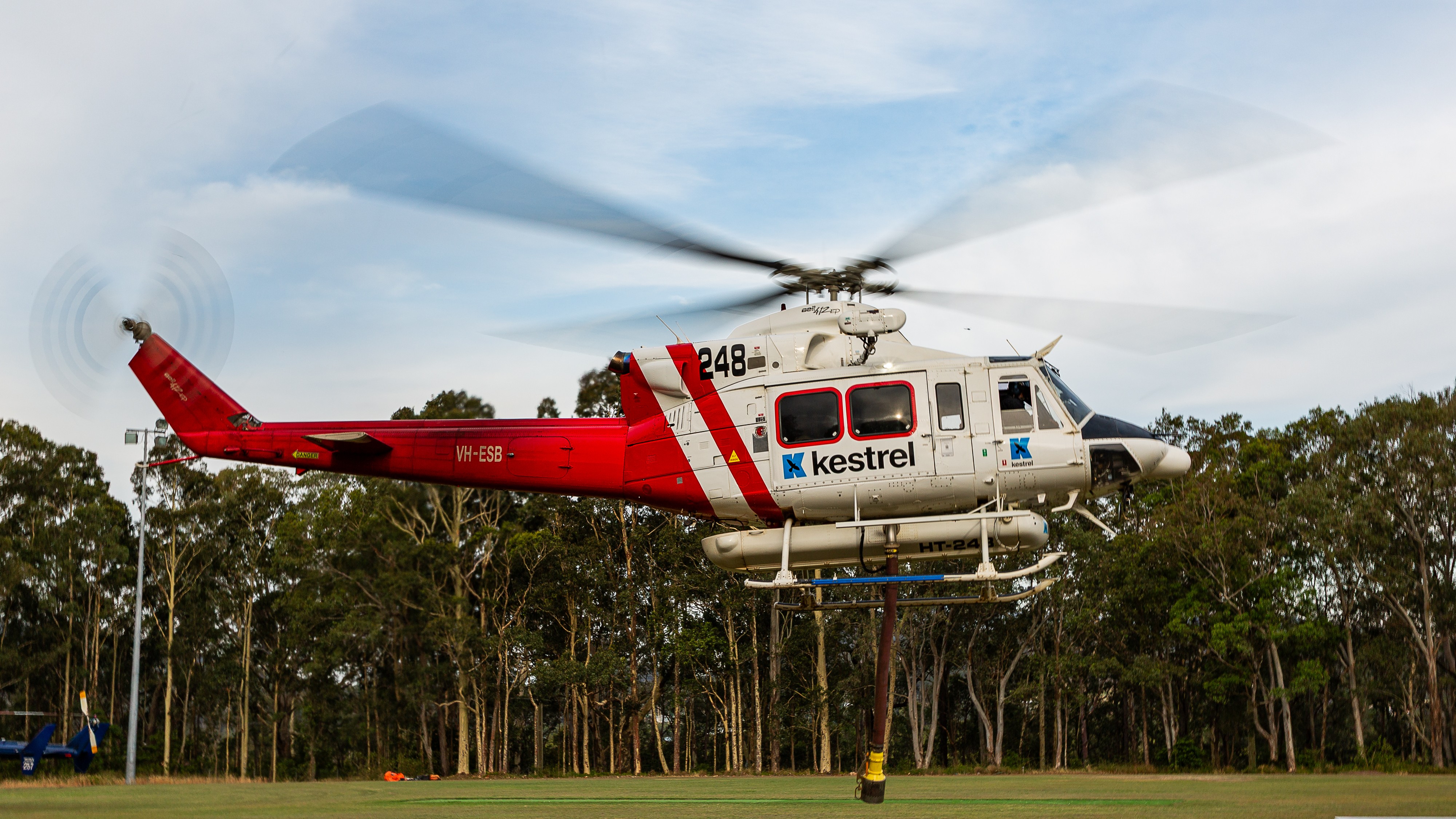 Kestrel Bell 412EP registration VH-ESB arriving at the forward operating base at Karuah, NSW, Australia while fighting a bushfire at north of Karuah on the 13th November 2025.