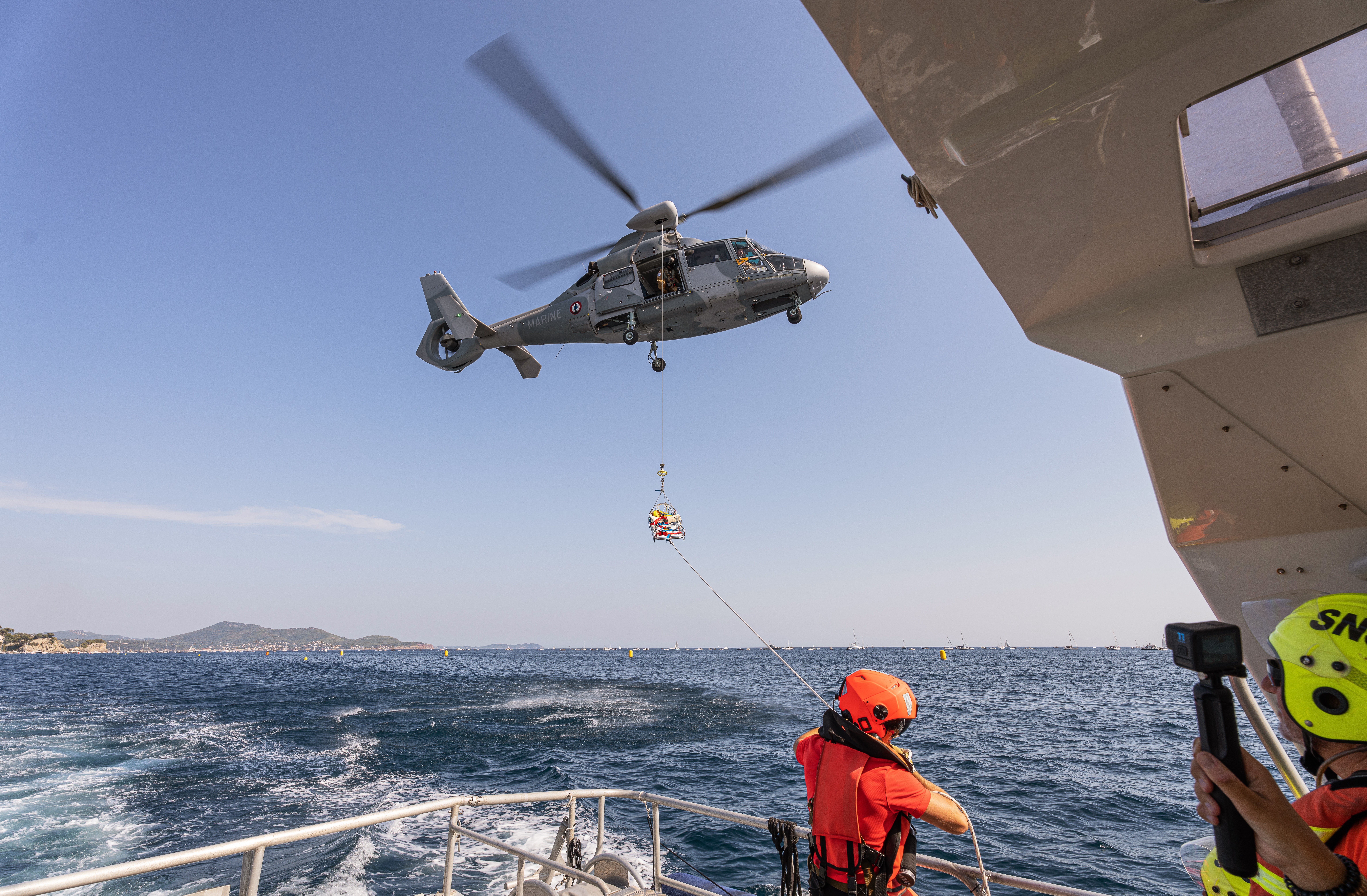 Dauphin helicopter demonstrating a winching operation with the SNSM (French Sea Rescue Society) during the Toulon air show