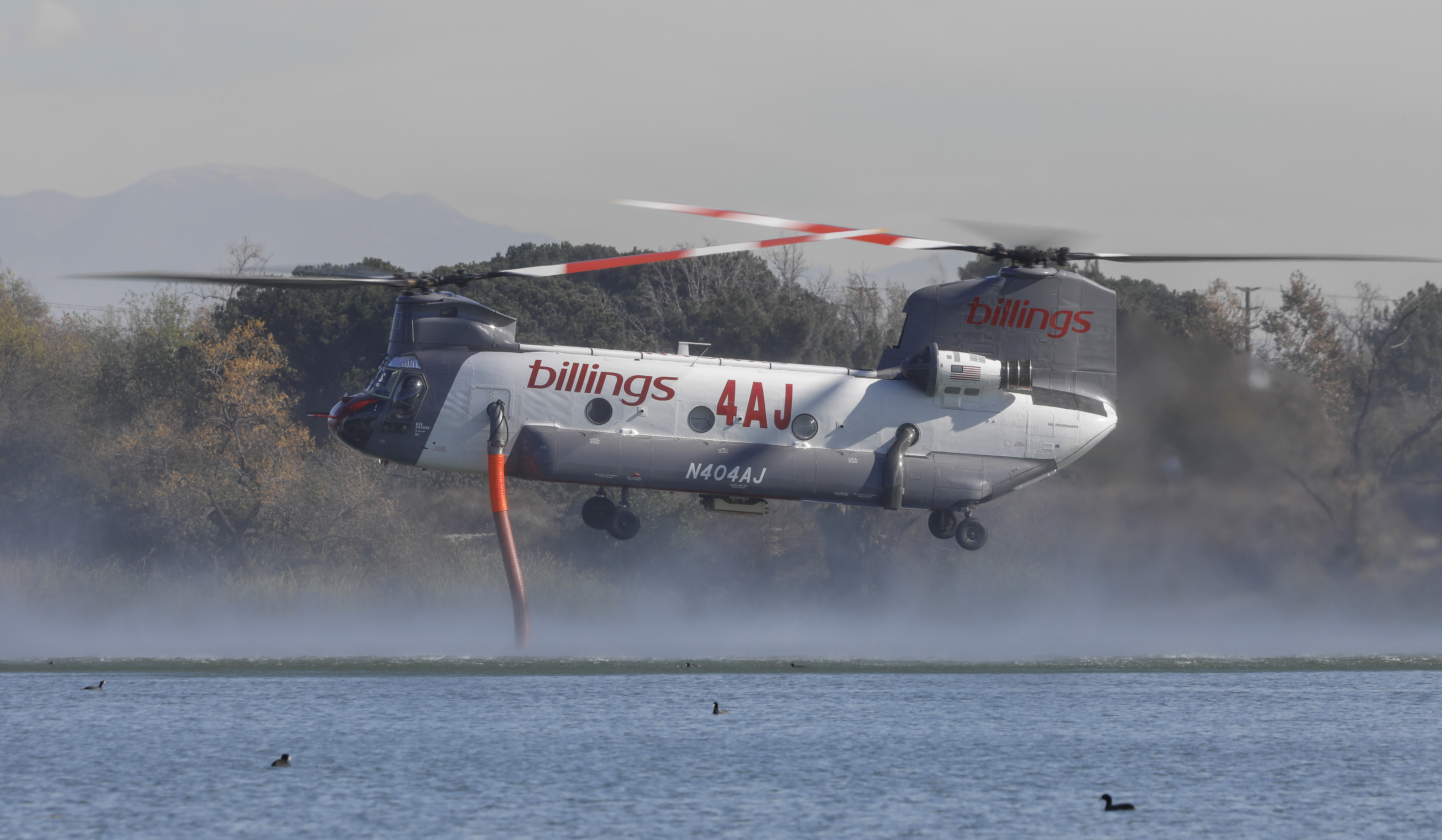 Billings helitanker 4AJ grabbing water from the Santa Fe Dam Recreation Area in Irwindale, CA as they were battling the Eaton Fire in Los Angeles County.