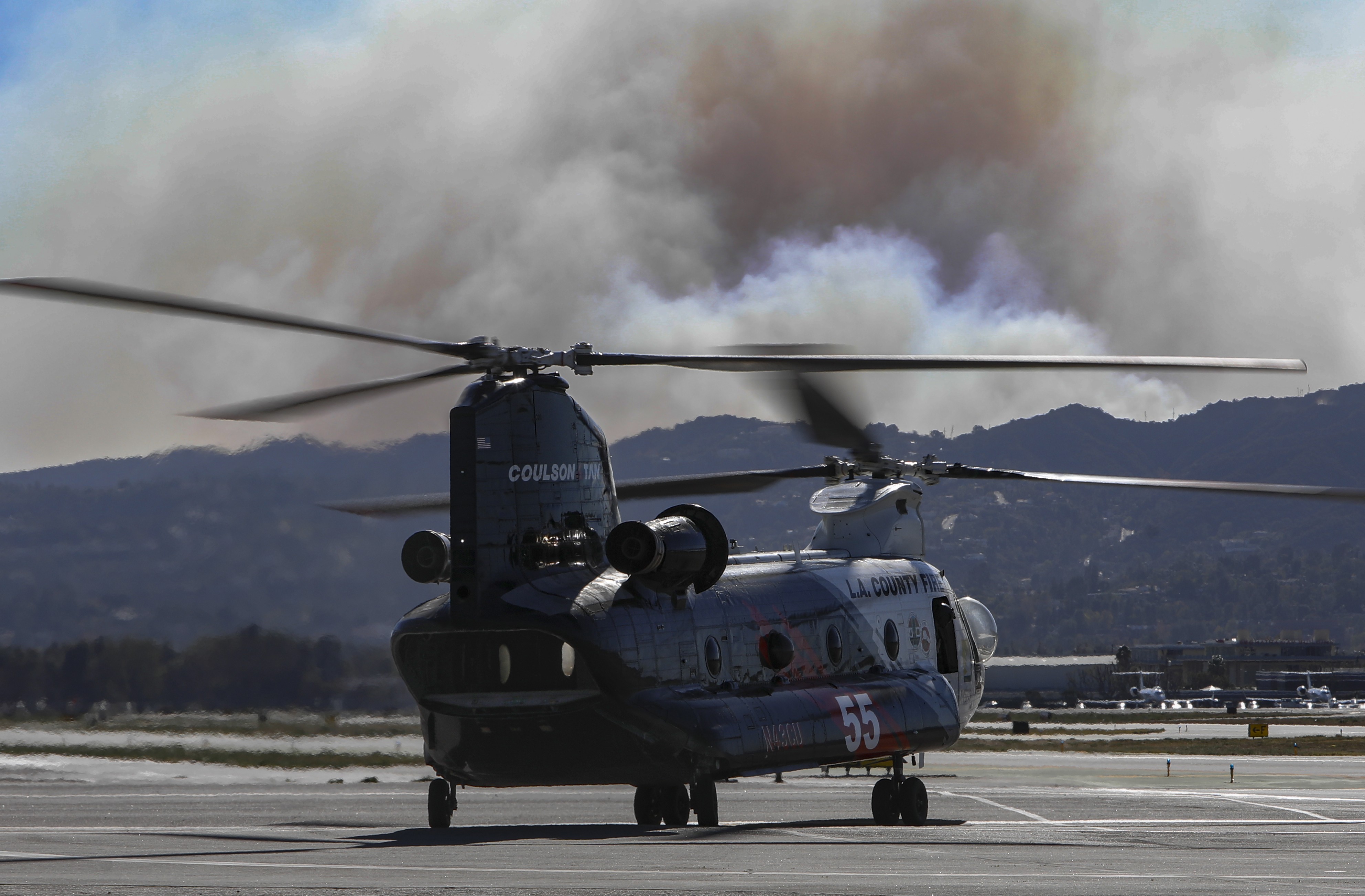 Coulson Aviation Helitanker 55 taxiing on the ramp of the Van Nuys airport during the Palisades Fire, after hot-fueling on the ramp before returning to the firefight.