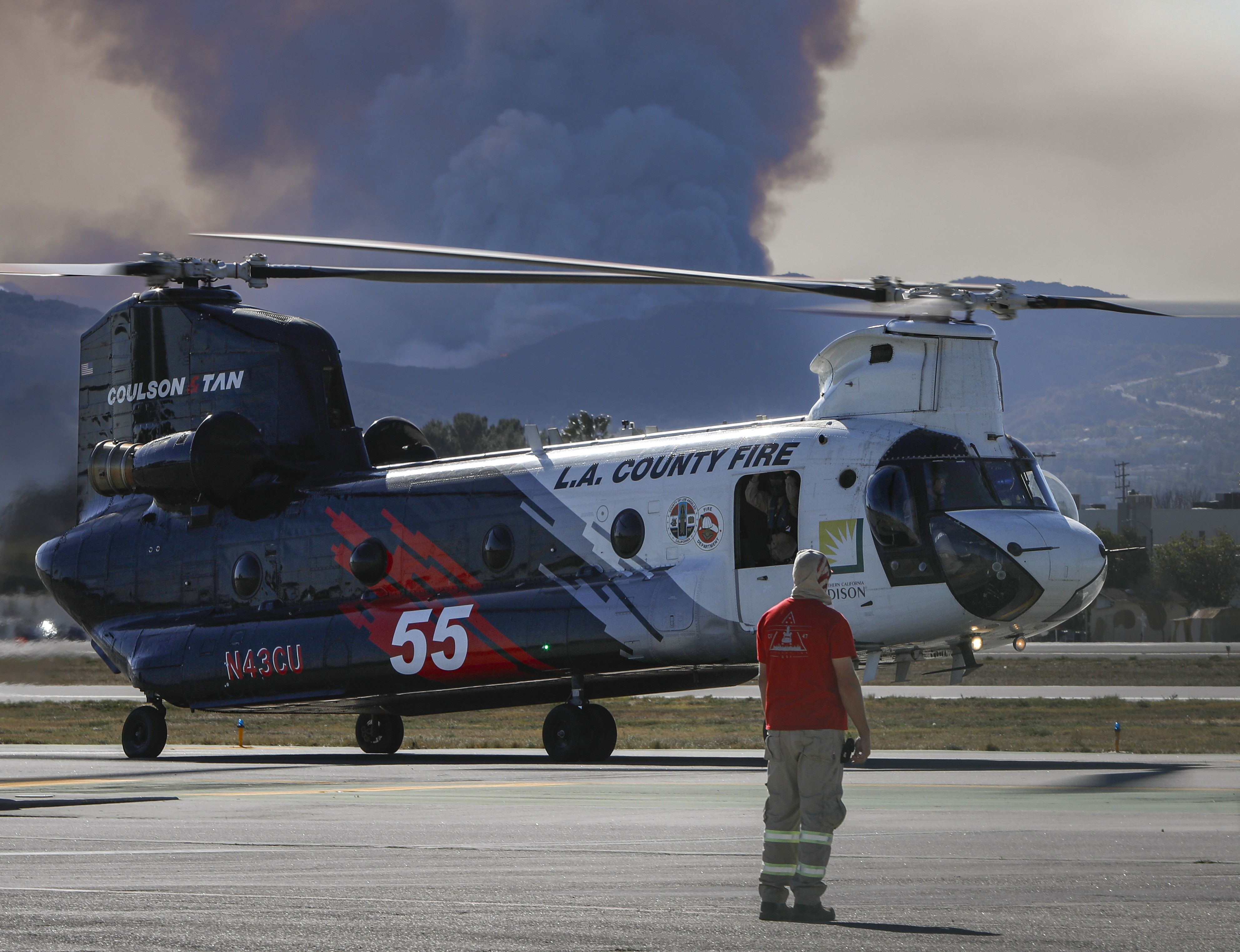 Coulson Aviation Helitanker 55 on their way out of the Van Nuys airport following a hot-fueling procedure on the ramp, and returning to the Palisades Fire.