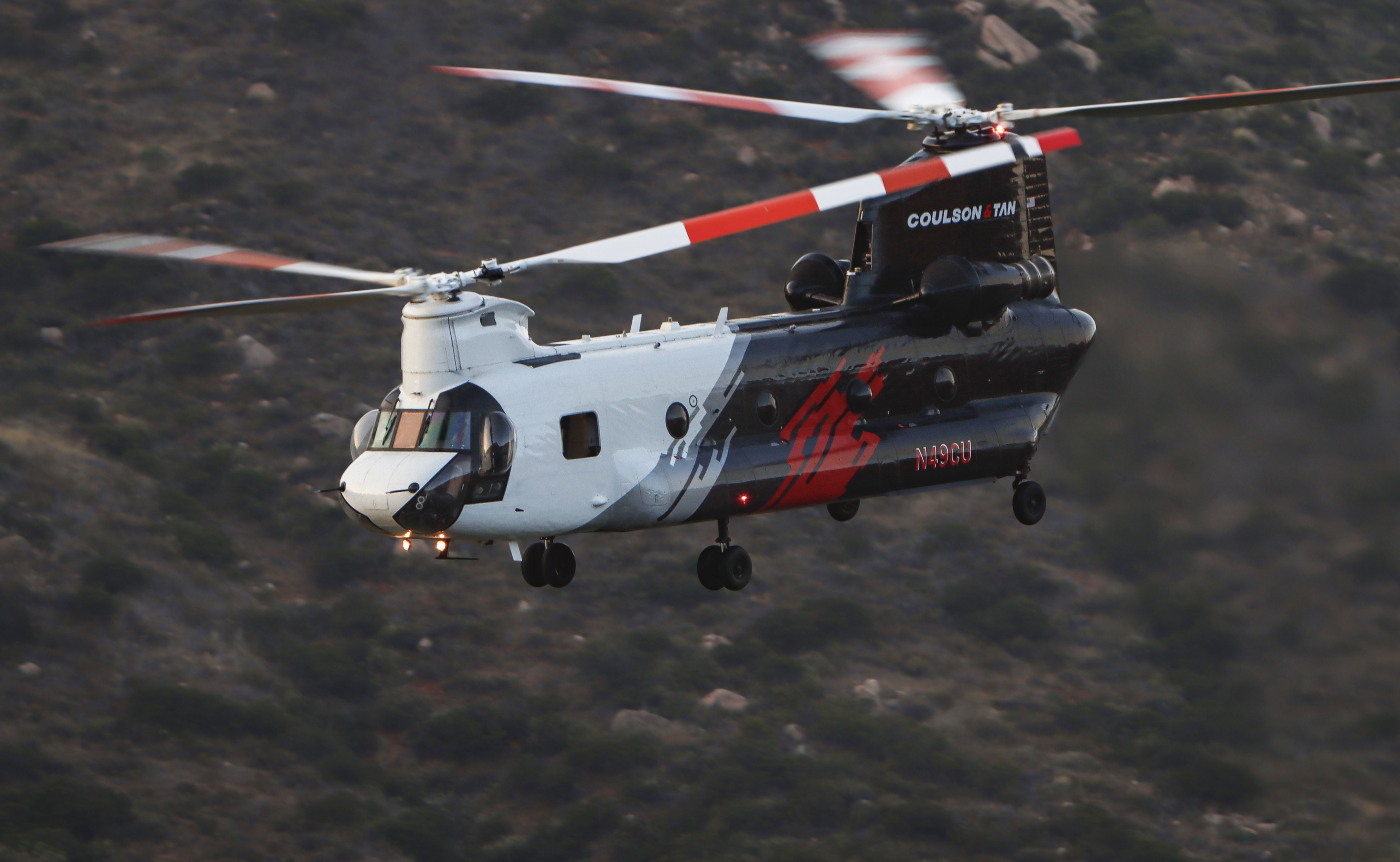 Coulson Aviation Helitanker 49CU departs the El Capitan dip while supporting other firefighting agencies on containing a large vegetation fire in Lakeside, CA dubbed the Monte Fire.