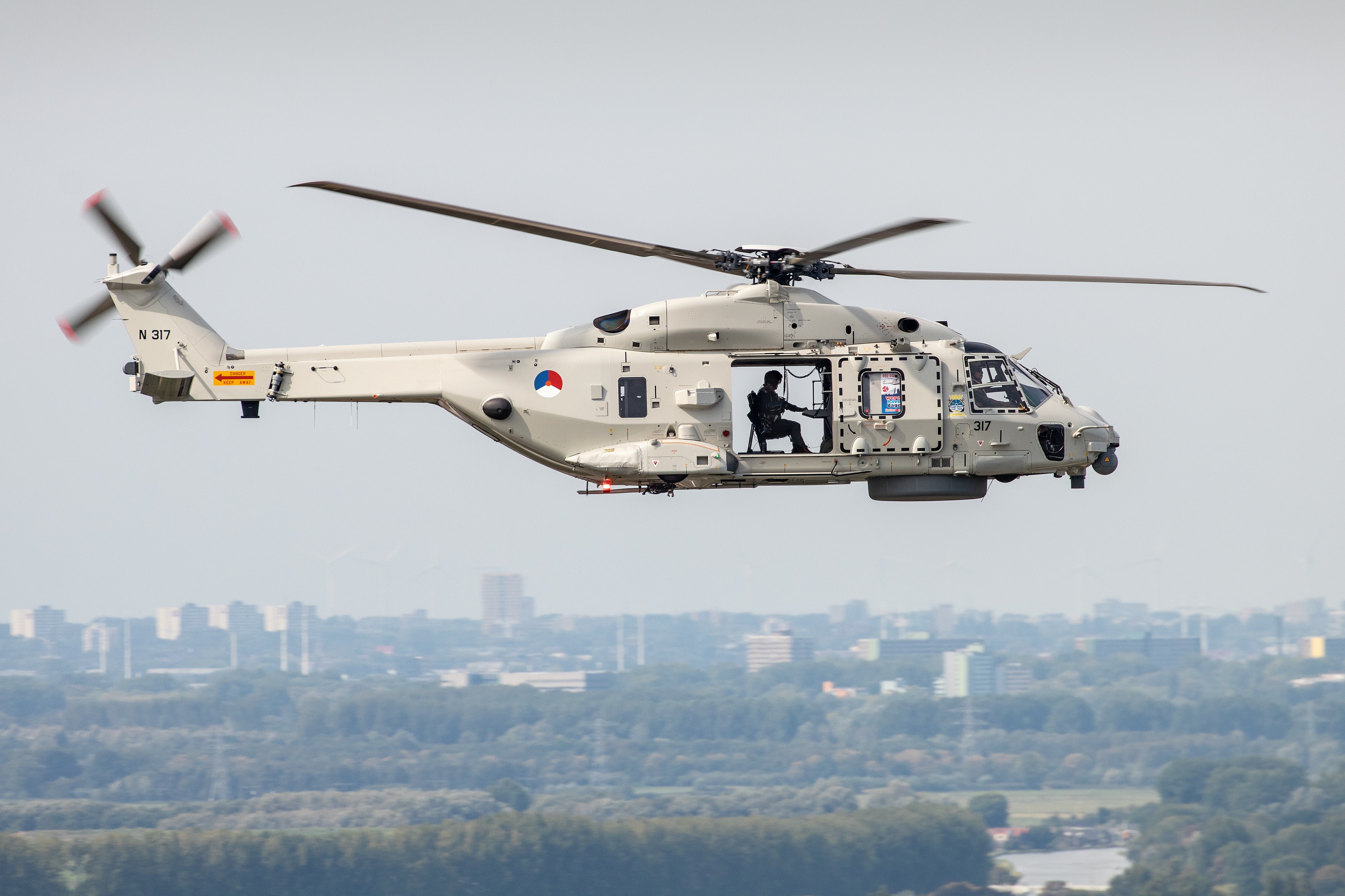 860 squadron Sensor operator at work on board of his NH90NFH, prior to performing a dummy torpedo drop. Photo is taken during World Port Days in Rotterdam