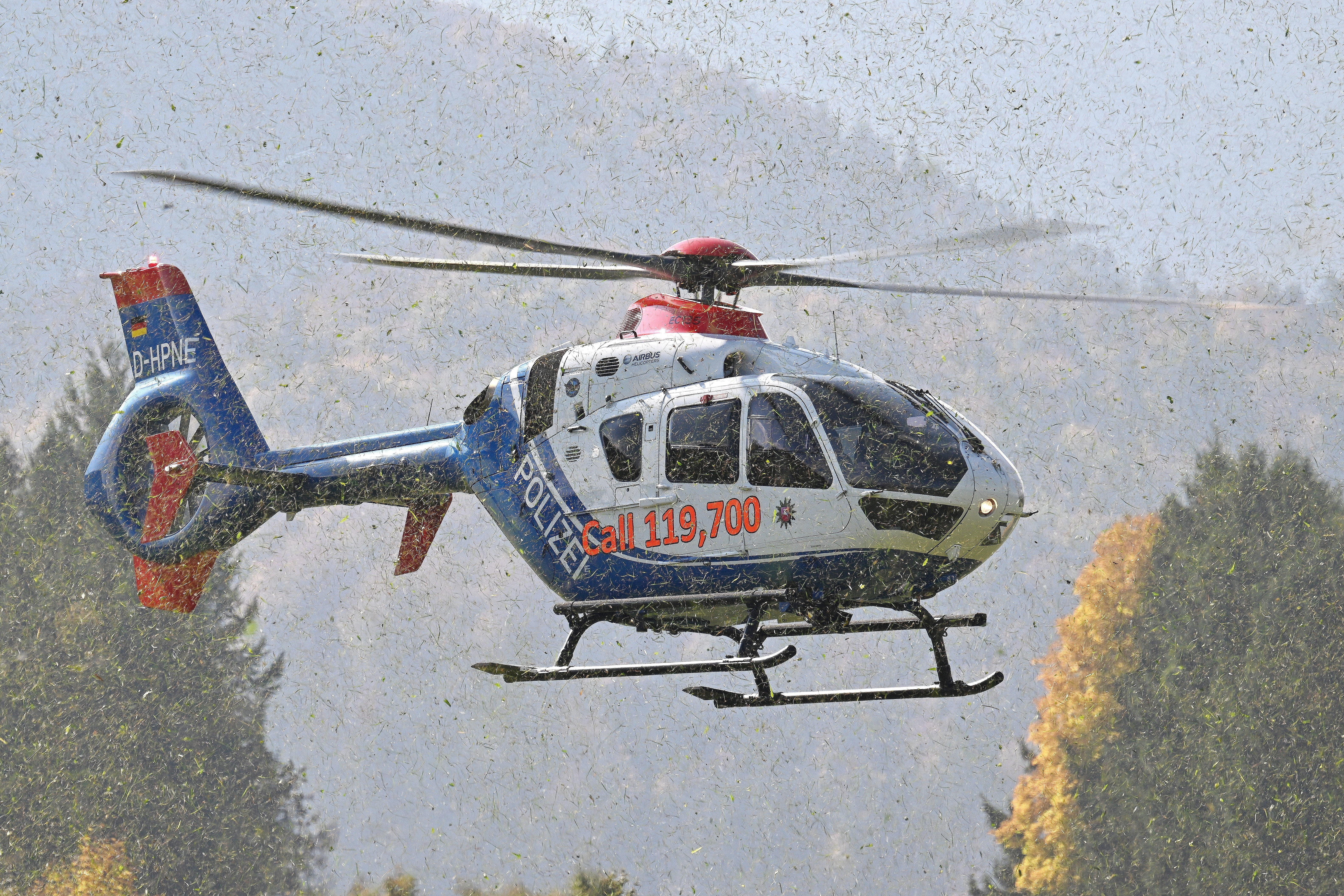 The grass was just cut before this Lower Saxony Police EC135P2+ landed  in Fussen  during the annual police helicopter mountain training
